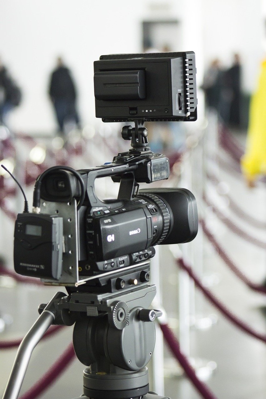 a video production camera up close with blurry background